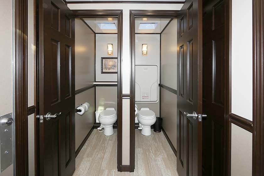 PRIVATE TOILET STALLS WITH FLOOR TO CEILING LOCKABLE DOORS